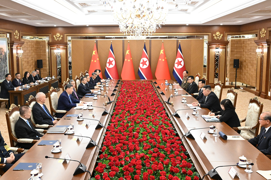 习近平同金正恩举行会谈