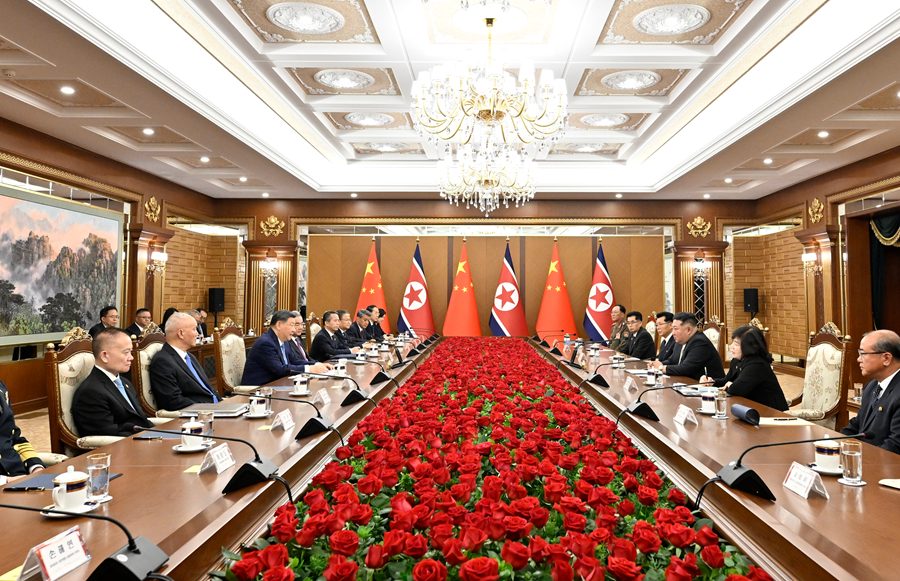 习近平同金正恩举行会谈