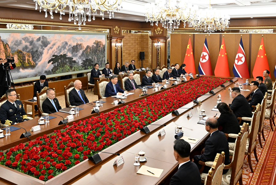 习近平同金正恩举行会谈